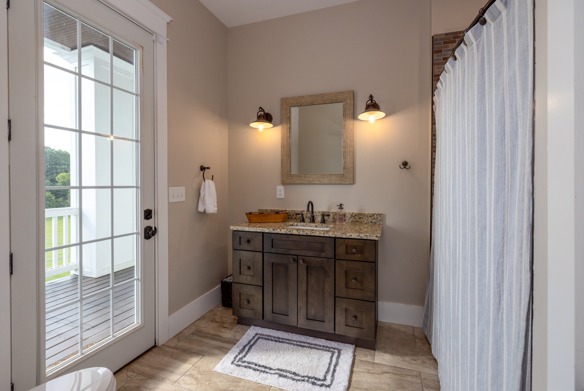 1181 Chicken Road Lebanon, TN 37090 - Photo 45 of 63 a bathroom with a sink and a mirror