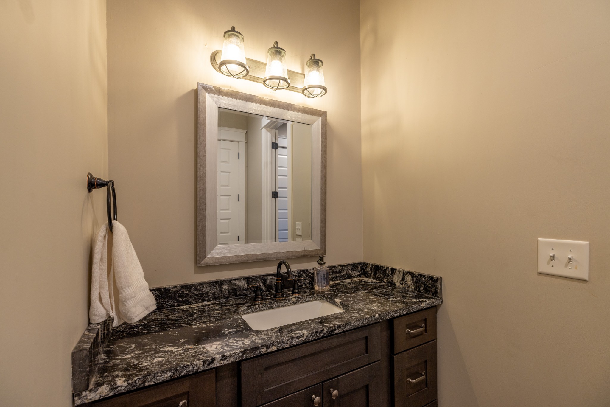 1181 Chicken Road Lebanon, TN 37090 - Photo 51 of 63 a bathroom with a granite countertop sink and a mirror