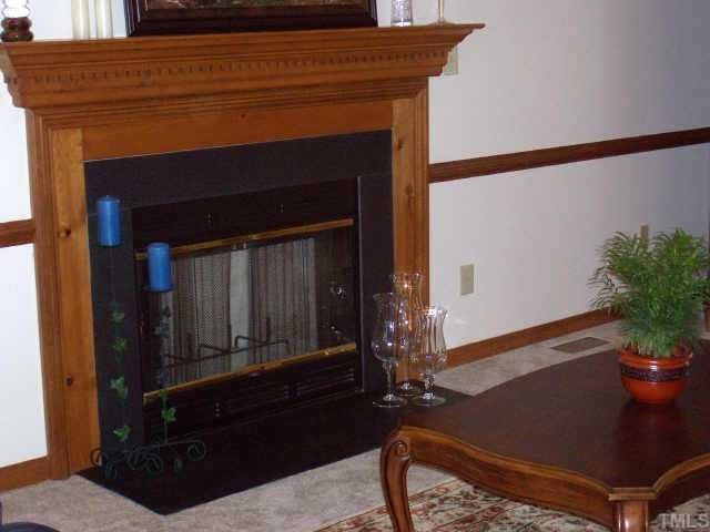 2236 Long And Winding Road Raleigh, NC 27603 - Photo 4 of 11 Living room fireplace positioned perfectly to cozy up to on those cold winter nights! Other