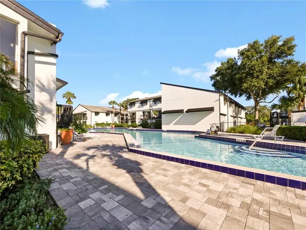a view of a house with a swimming pool