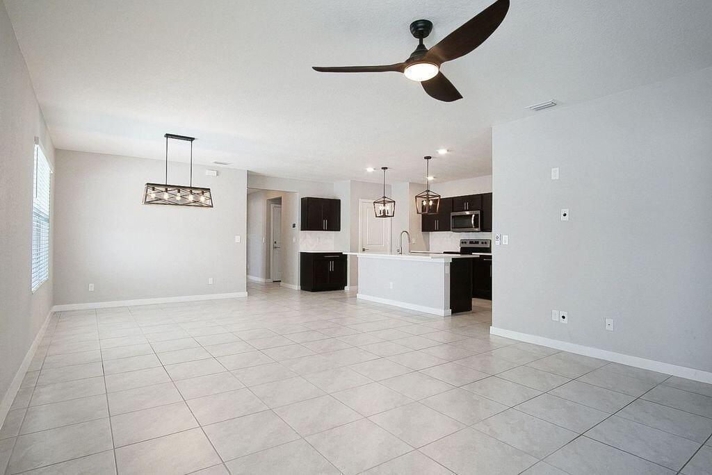 3909 Southeast Lee Street Stuart, FL 34997 - Photo 4 of 19 Living-Dining-Kitchen