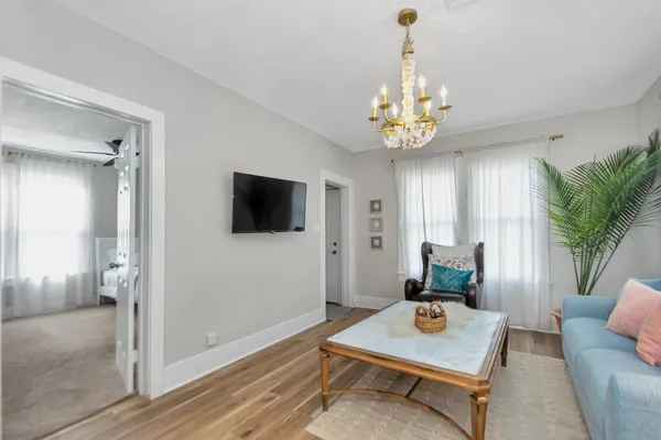 a view of a livingroom with furniture and window
