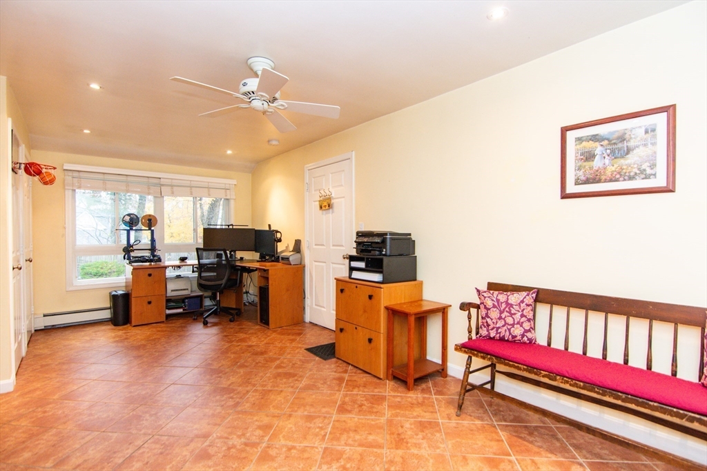 7 Sheffield Road Natick, MA 01760 - Photo 16 of 27 a living room with furniture and kitchen view