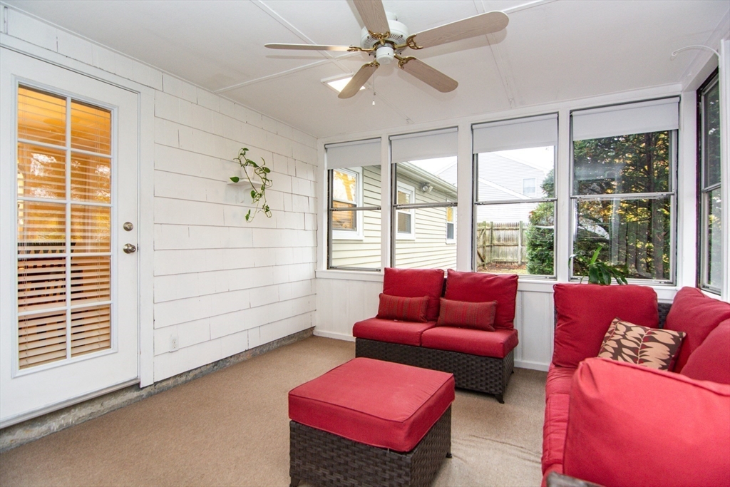 7 Sheffield Road Natick, MA 01760 - Photo 20 of 27 a living room with furniture and a window