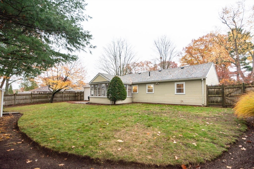 7 Sheffield Road Natick, MA 01760 - Photo 23 of 27 a front view of house with yard and trees