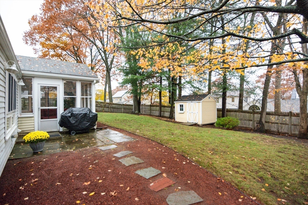 7 Sheffield Road Natick, MA 01760 - Photo 24 of 27 a view of a house with backyard and a tree