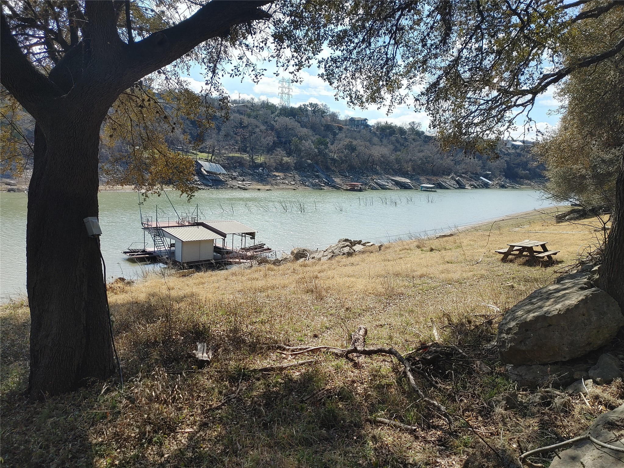 1909 Performer Road Spicewood, TX 78669 - Photo 2 of 19 a view of lake with mountain