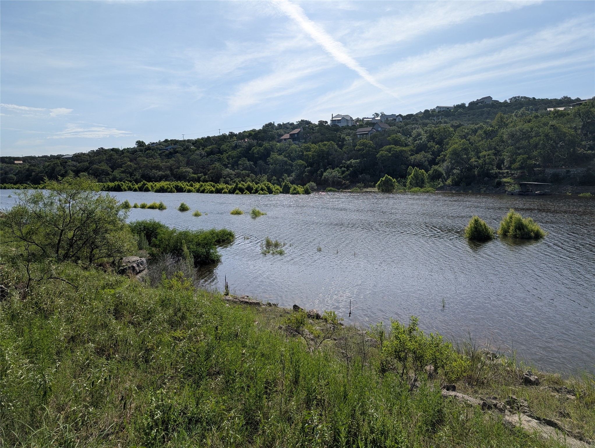 1909 Performer Road Spicewood, TX 78669 - Photo 3 of 19 a view of lake with mountain