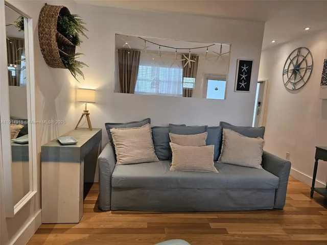 a bed room with a bed and a lamp