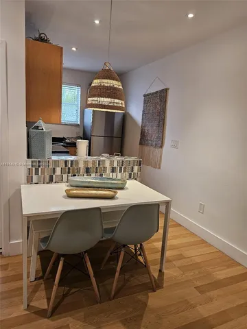 a view of a dining room with furniture
