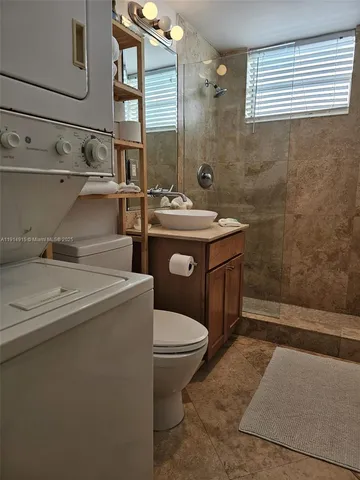 a bathroom with a sink and mirror