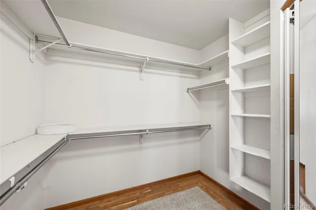 a view of an empty walk in closet