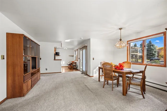 a view of a livingroom with furniture and furniture