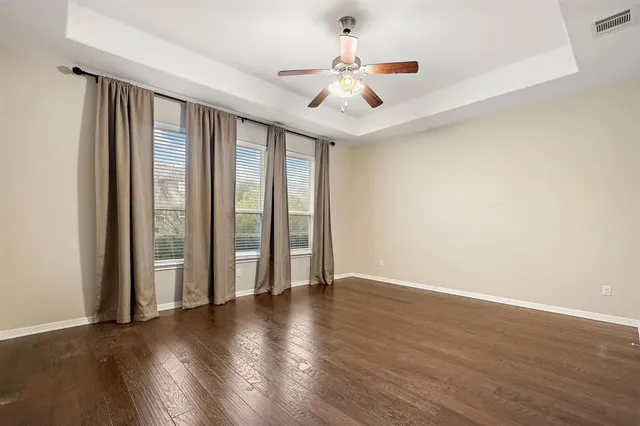 a bathroom with a double vanity sink mirror and shower