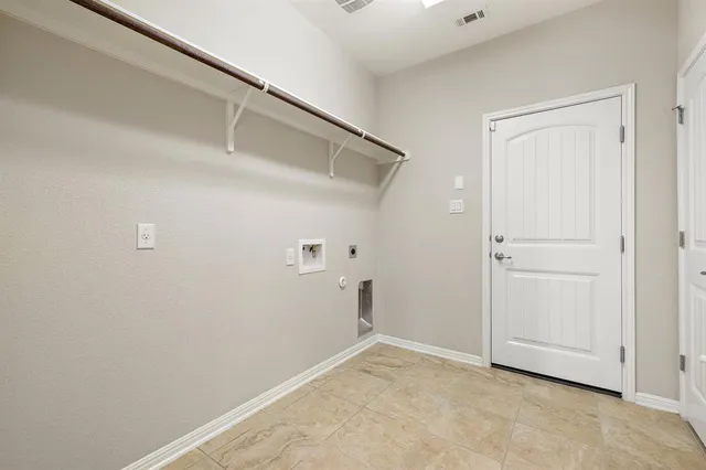 a bathroom with a sink toilet and a mirror