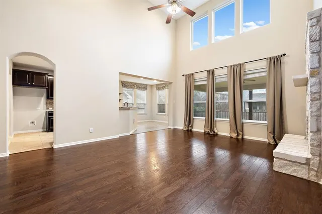 a view of an entryway with wooden floor
