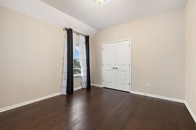a bathroom with a sink a bathtub and a mirror