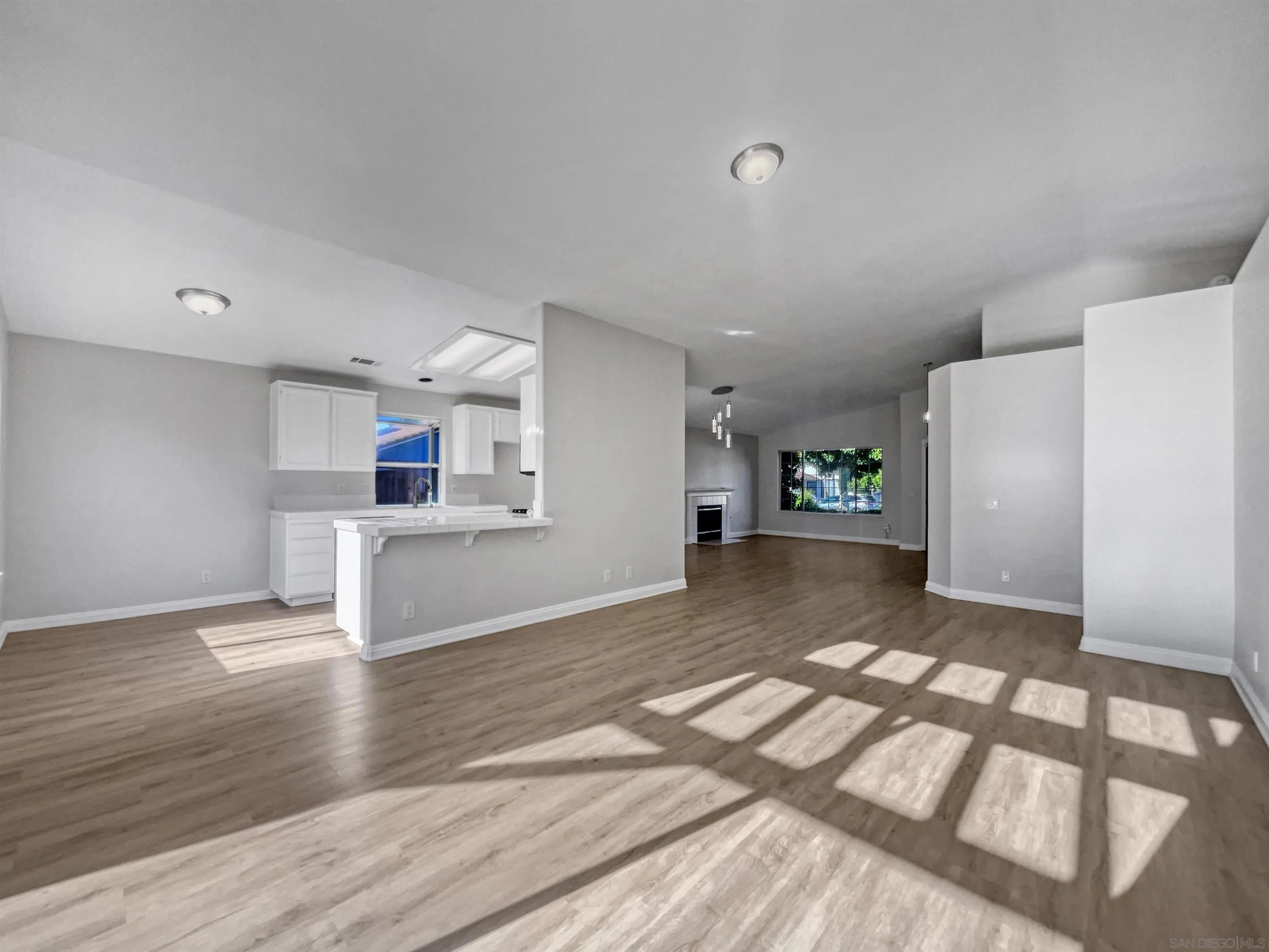 140 South Mercedes Road Fallbrook, CA 92028 - Photo 9 of 21 a view of a kitchen with a sink and a refrigerator