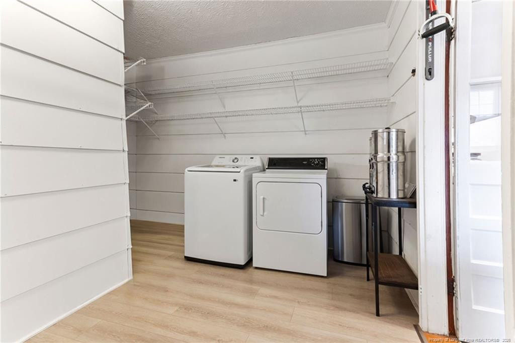1069 Union Valley Road Whiteville, NC 28472 - Photo 14 of 50 a utility room with dryer and washer