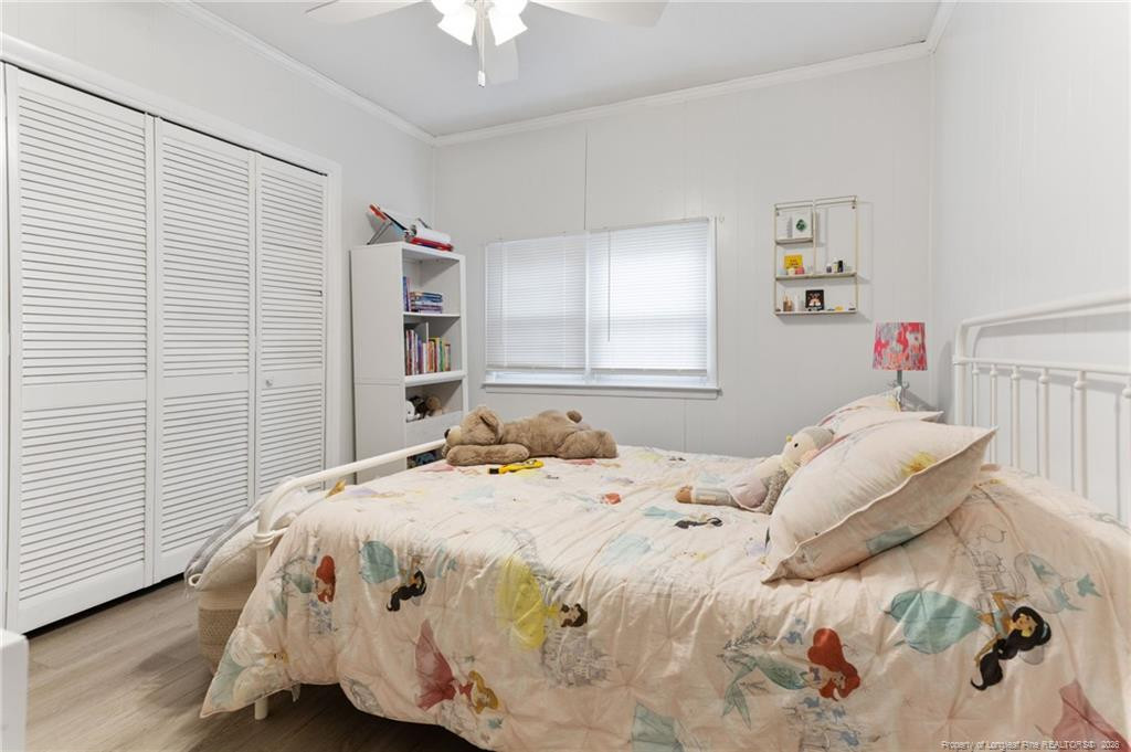 1069 Union Valley Road Whiteville, NC 28472 - Photo 15 of 50 a bedroom with a bed and a window