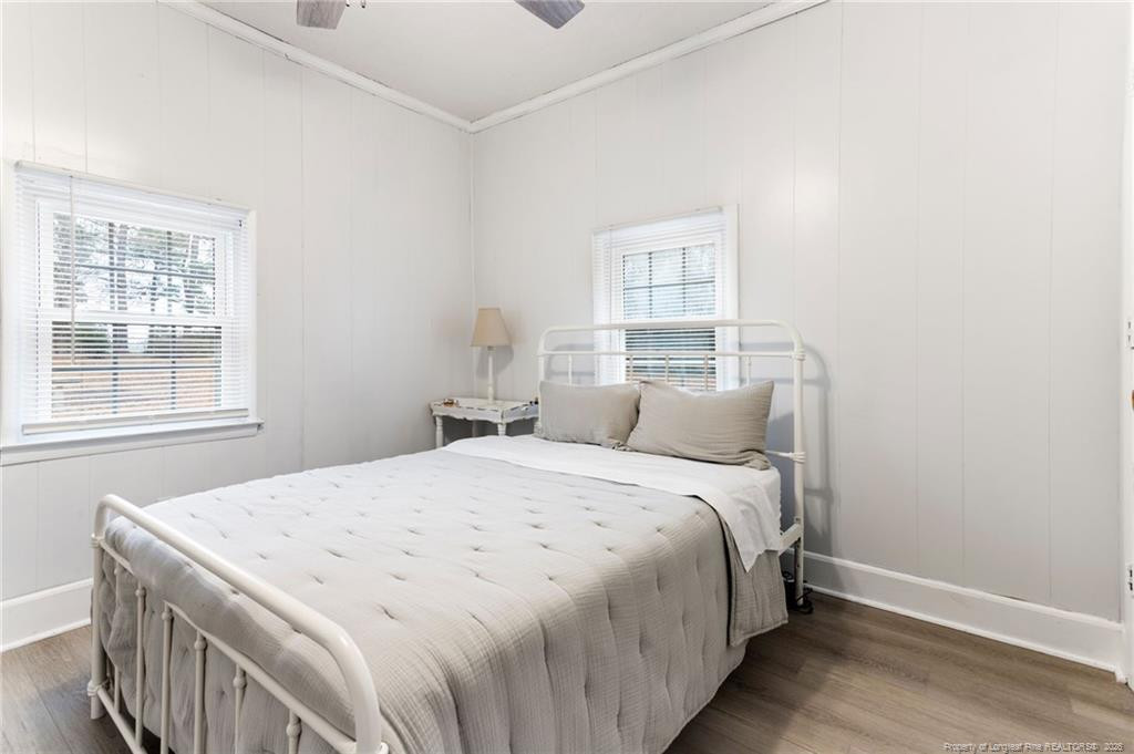 1069 Union Valley Road Whiteville, NC 28472 - Photo 17 of 50 a bedroom with a bed and a window