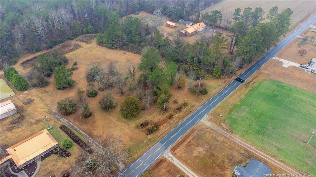 1069 Union Valley Road Whiteville, NC 28472 - Photo 41 of 50 a view of a yard from a balcony