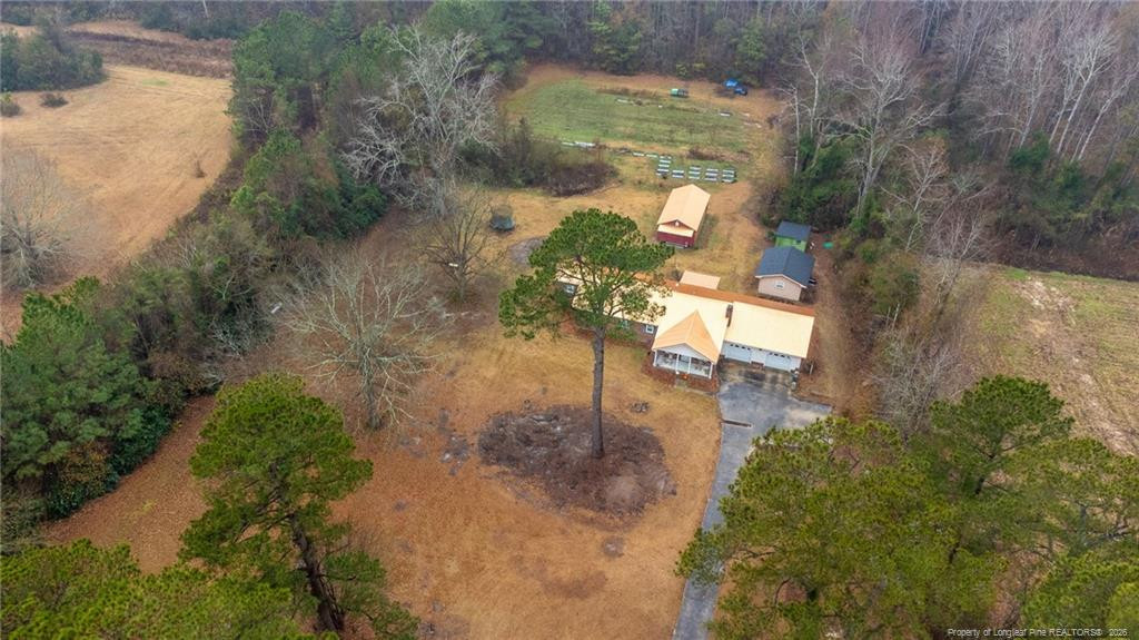 1069 Union Valley Road Whiteville, NC 28472 - Photo 44 of 50 an aerial view of a house with a yard