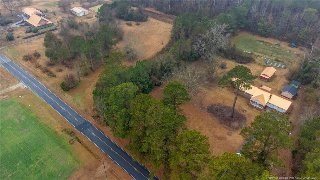 1069 Union Valley Road Whiteville, NC 28472 - Photo 46 of 50 a view of a garden from a balcony
