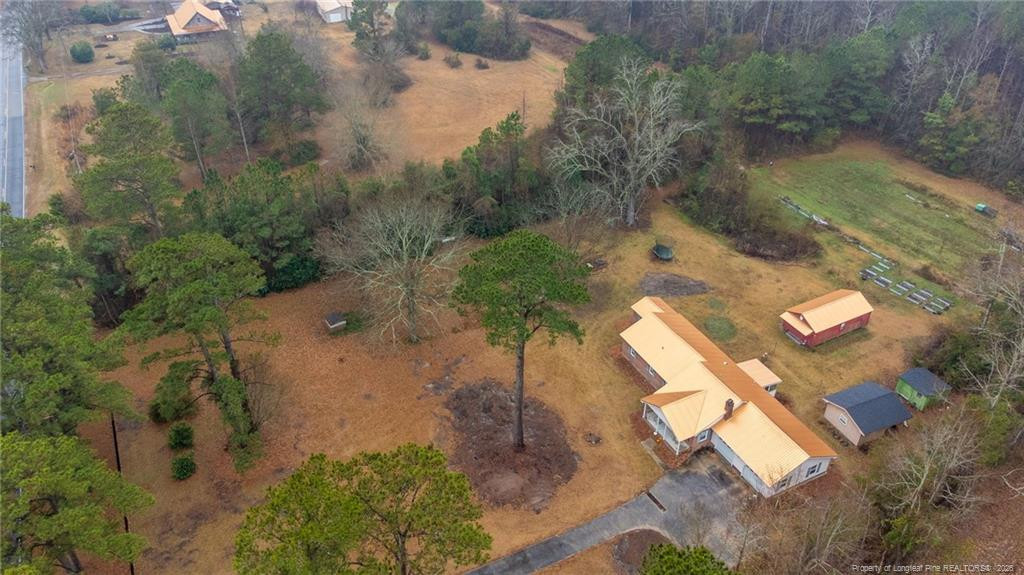 1069 Union Valley Road Whiteville, NC 28472 - Photo 49 of 50 an aerial view of a house with a yard