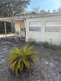 4405 Airport Road Plant City, FL 33563 - Photo 2 of 20 a view of a house with a yard