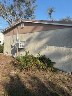 4405 Airport Road Plant City, FL 33563 - Photo 5 of 20 a backyard of a house with a yard and garage