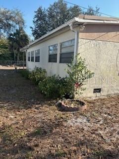 4405 Airport Road Plant City, FL 33563 - Photo 6 of 20 a backyard of a house with lots of green space