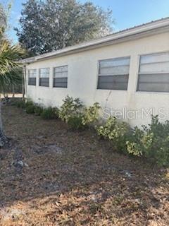4405 Airport Road Plant City, FL 33563 - Photo 7 of 20 a house with a yard
