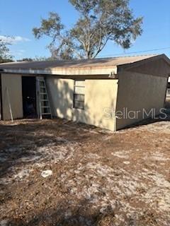 4405 Airport Road Plant City, FL 33563 - Photo 8 of 20 a view of a car garage