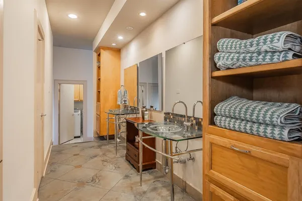 a open kitchen with stainless steel appliances granite countertop a sink and cabinets