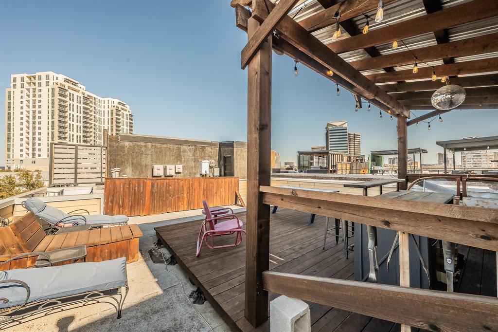 3911 Gilbert Avenue, Unit G Dallas, TX 75219 - Photo 31 of 35 a very nice looking room with a large window