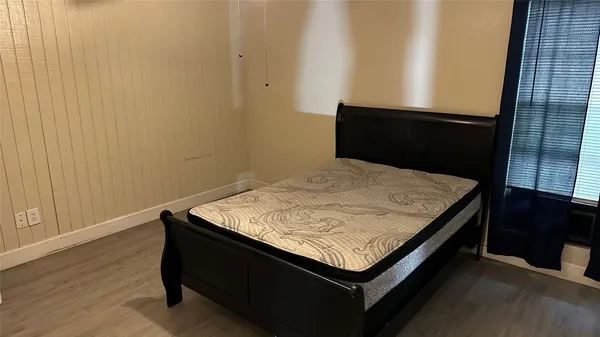 a utility room with a bed