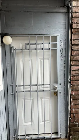 a view of swimming pool with outdoor seating