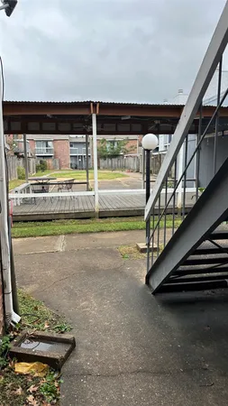 a view of swimming pool with outdoor seating