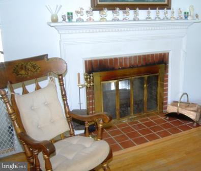 7830 Waterloo Road Jessup, MD 20794 - Photo 10 of 13 Living room fireplace