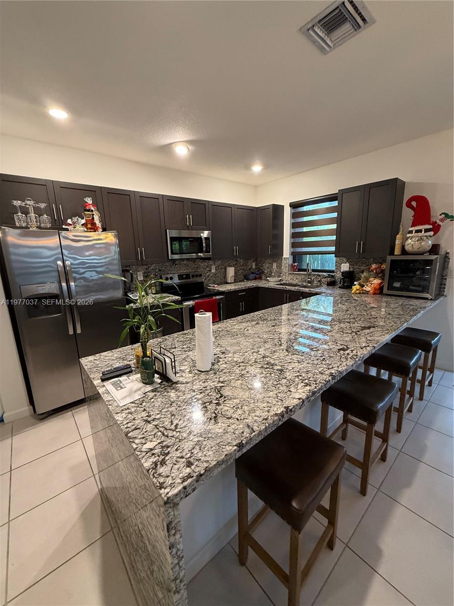 25216 Southwest 108th Court Homestead, FL 33032 - Photo 10 of 36