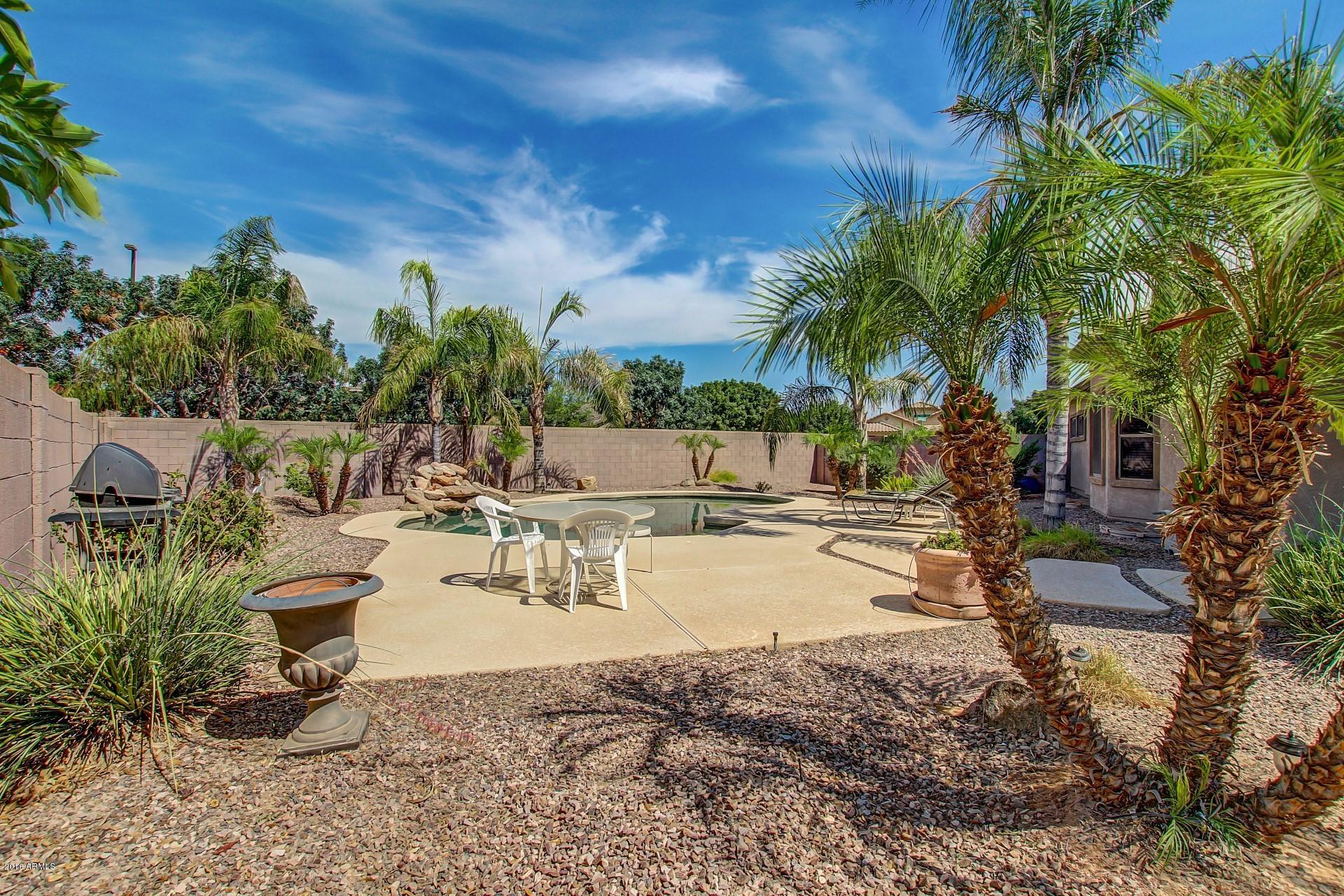 4165 East Los Altos Road Gilbert, AZ 85297 - Photo 2 of 44 LARGE YARD WITH POOL AND DECK AREA