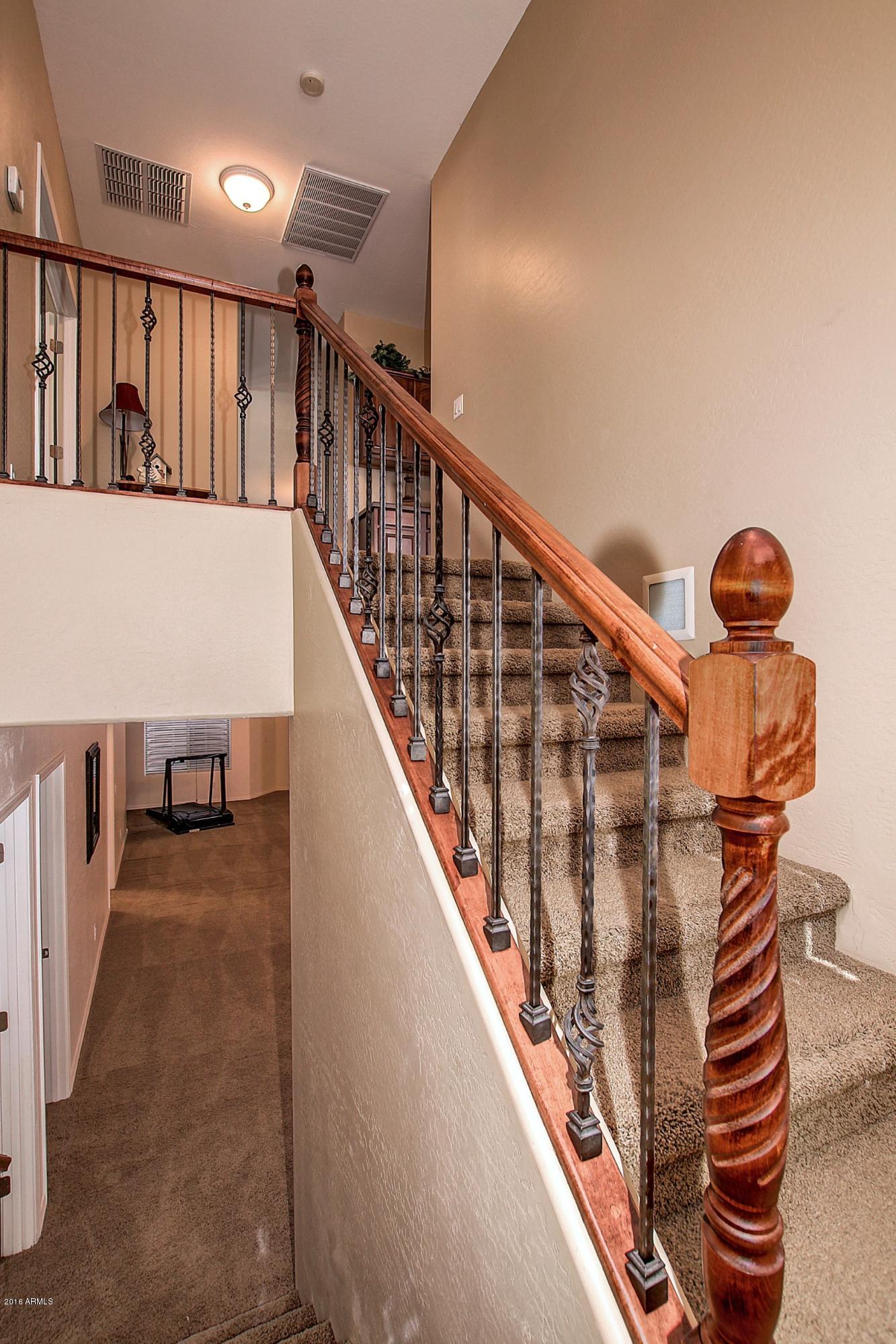 4165 East Los Altos Road Gilbert, AZ 85297 - Photo 25 of 44 UPGADED RAILING TO BASEMENT