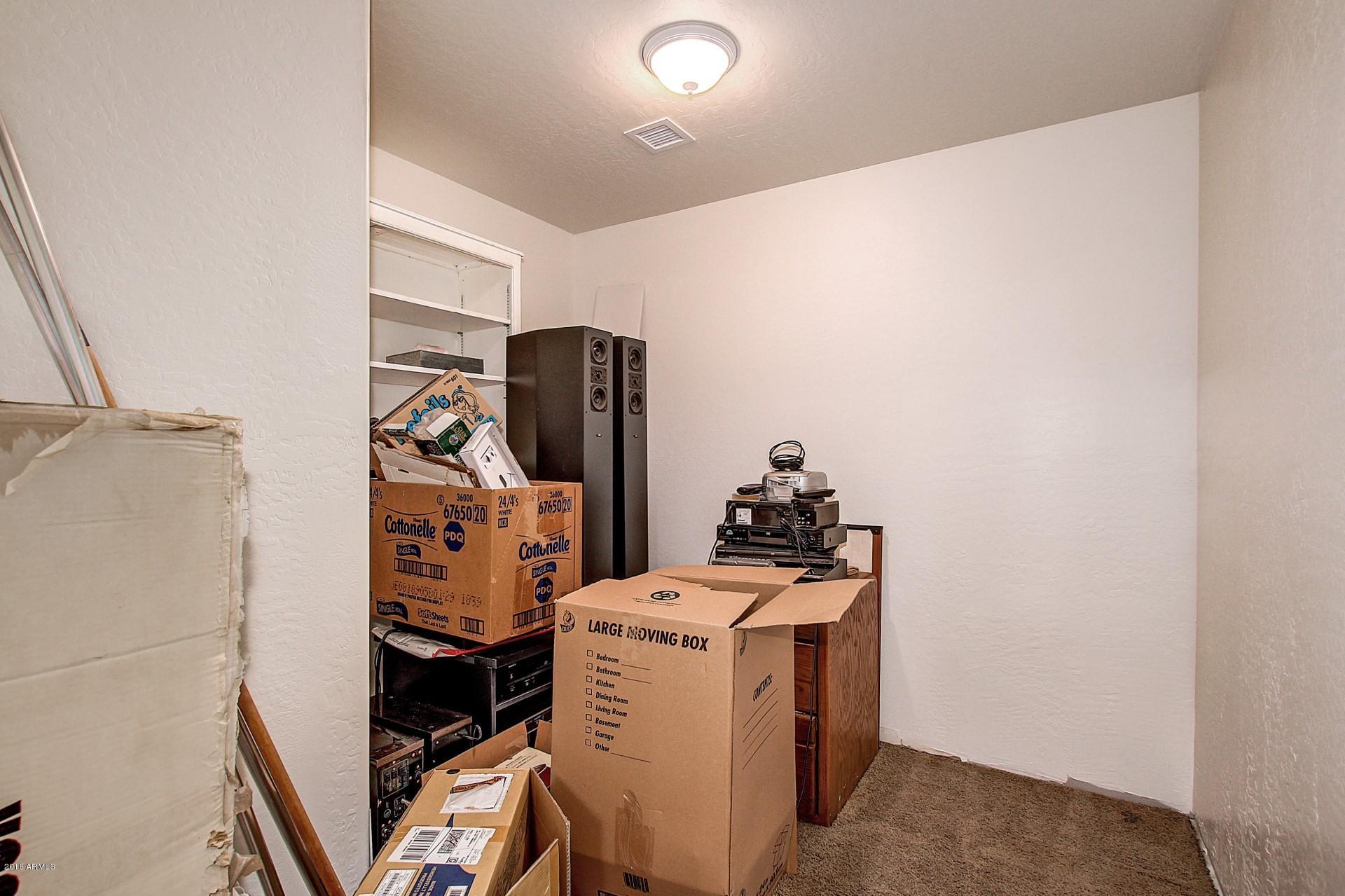 4165 East Los Altos Road Gilbert, AZ 85297 - Photo 34 of 44 STORAGE ROOM IN BASEMENT