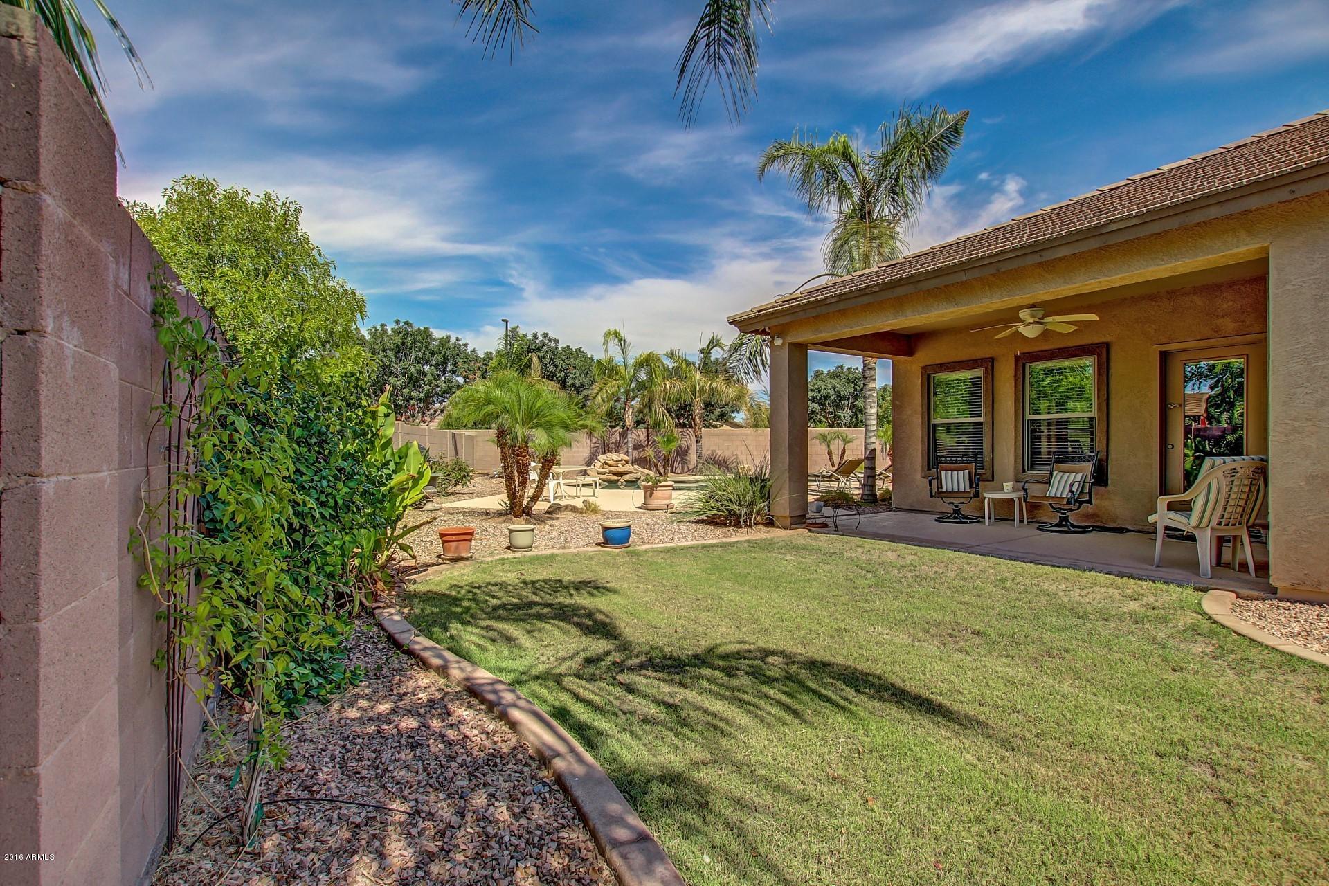 4165 East Los Altos Road Gilbert, AZ 85297 - Photo 35 of 44 COVERED PATIO WITH FAN - Copy