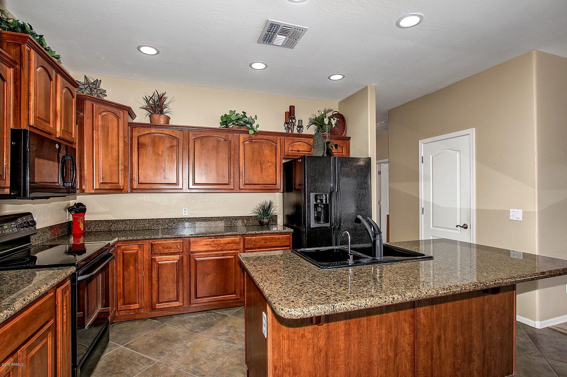 4165 East Los Altos Road Gilbert, AZ 85297 - Photo 5 of 44 GRANITE COUNTER TOPS IN KITCHEN - Copy