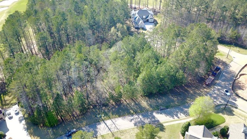 282 Manchester Lane Villa Rica, GA 30180 - Photo 2 of 15 a backyard of a house with lots of green space
