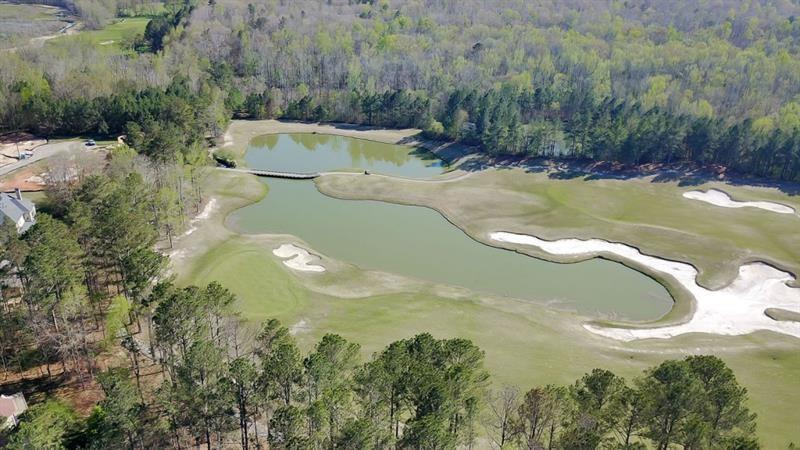 282 Manchester Lane Villa Rica, GA 30180 - Photo 10 of 15 a view of a swimming pool with a yard