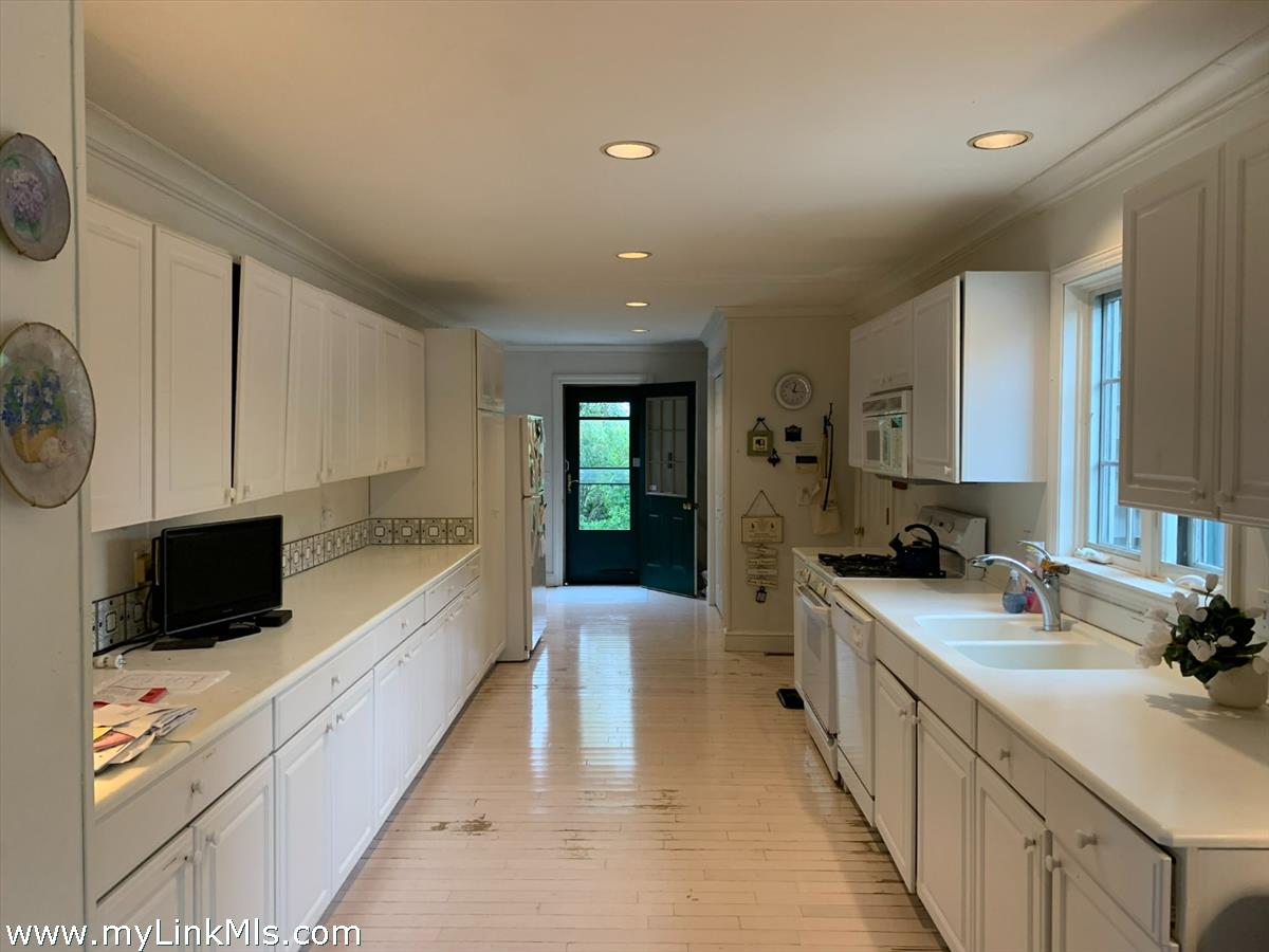 160 Madaket Road Nantucket, MA 02554 - Photo 14 of 58 Kitchen with laundry and exit to side yard