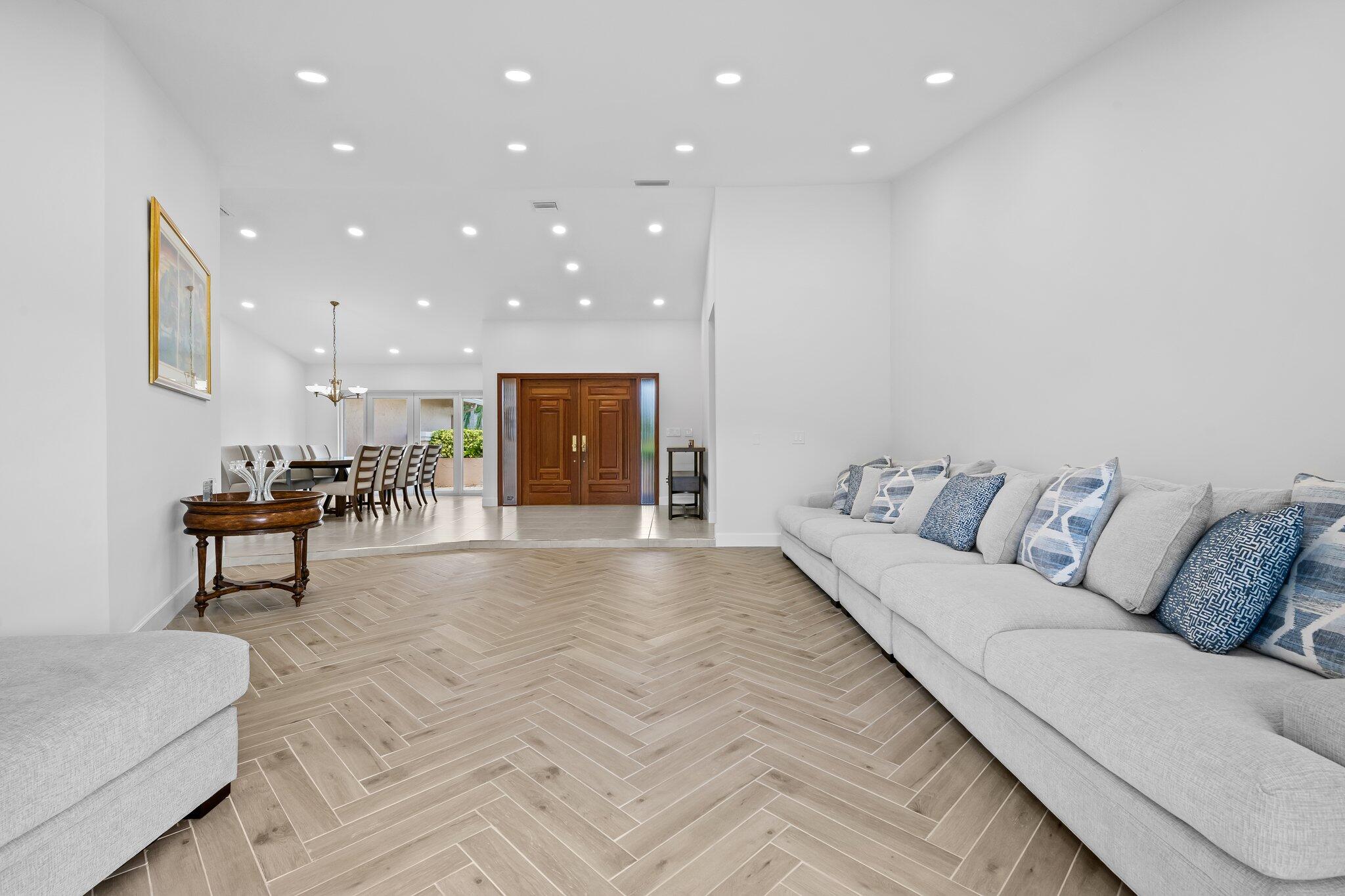 11937 Sandlake Drive Boca Raton, FL 33428 - Photo 16 of 54 a living room with furniture and a table